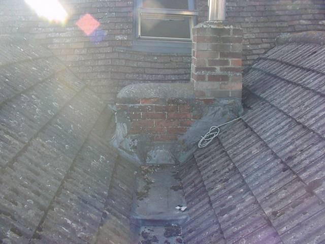 Rear chimney located in valley gutter Dampness coming into property