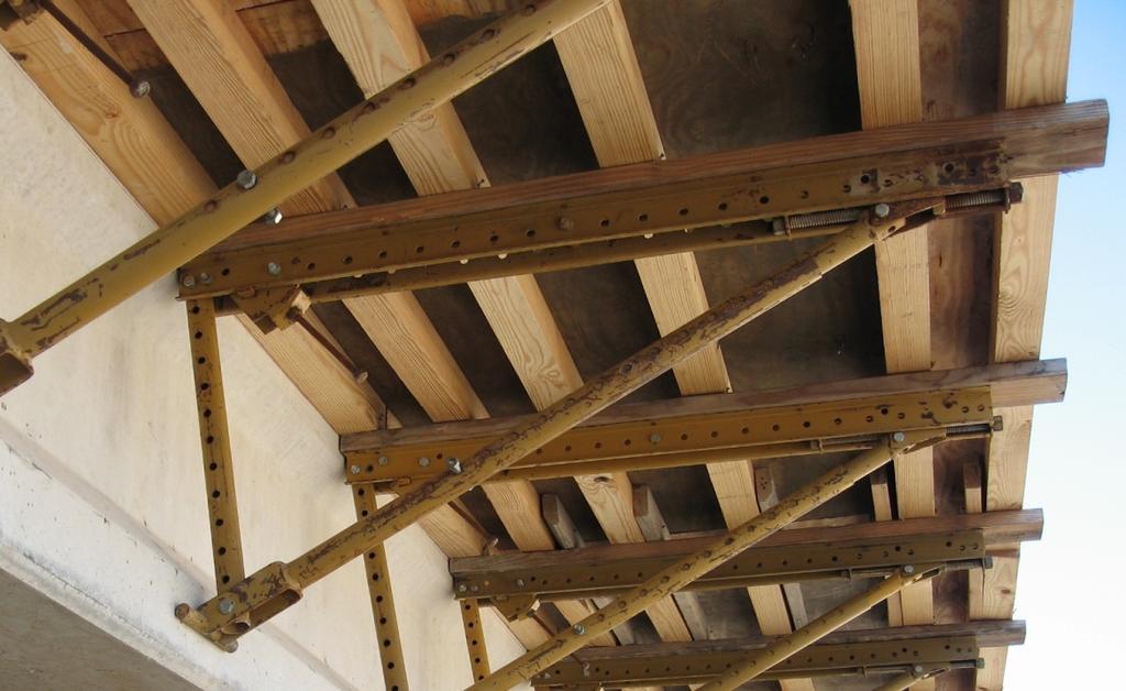 4x4 Joists Plywood Sheathing 2x6 Figure 2-6: Underside of overhang formwork Another function of the overhang brackets is to also support a work platform outside of the overhang.