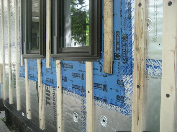 between the rafters; ½ plywood; fully-adhered membrane; asphalt shingles.