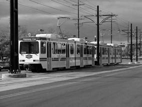 Since tracks are flush with the street surface, LRT can be operated in areas with pedestrian, cyclist, or automobile activity. Vehicles typically receive power from an overhead wire.