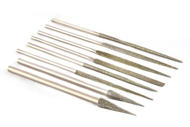 DIAMOND FILES AND ANGLE PINS Diamond Files are offered in the form of Needle Files, Riffler Files, Diprofile Files and in the normal sizes.