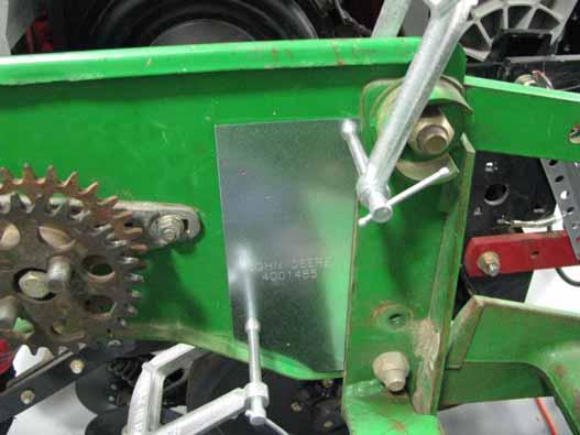 Ag Leader Technology SeedCommand 4. Find template that is included in kit. Install template on inside of row unit as shown in Figure 5. Template may be held in place with C-clamps. 5. Using supplied center punch, mark three holes in row unit.