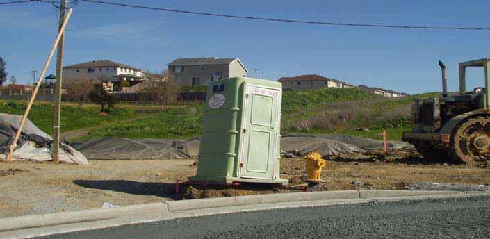 Portable Toilet Placement Locate in a flat area at least 50 feet away