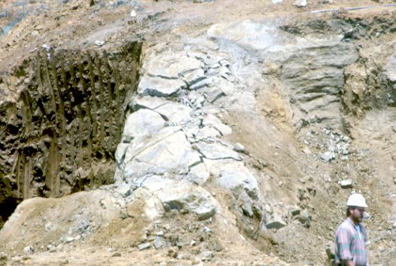 After the blast, the rock formation is fractured, allowing easier removal and loading of the rock to be carried away.