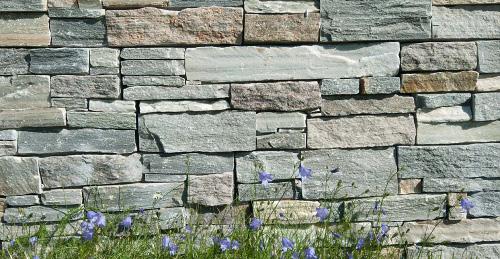 Why use stone panel system? natural stone panels are made from natural stone only and are laid out as a dry-stone wall. All panels interlock together on both straight walls as well as at corners.