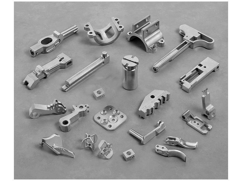 Figure 18-12 Flow chart of the metal injection molding process (MIM) used to produce small, intricate-shaped parts from metal powder.