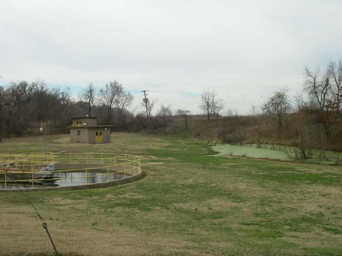 of the pond levee. Looking to southwest from Gentry WWTP.