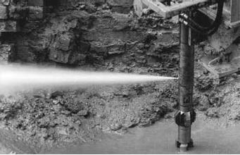 When the pipe is pulled out and rotated simultaneously, a cylindrical body of soil and cement is