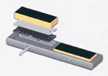 loadings, an arrangement based on low-friction flexible replaceable sliding pads (Lubripad, Polypad or Unipad) or non-sliding flexible