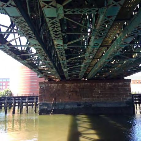 adjacent to existing bridge piers Construction adjacent