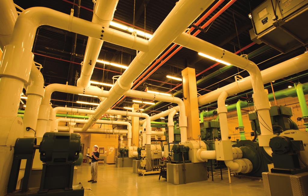To reduce energy consumption and improve operation, the solution was to install VFDs to control the existing chiller motors, but there were three main challenges: 1.