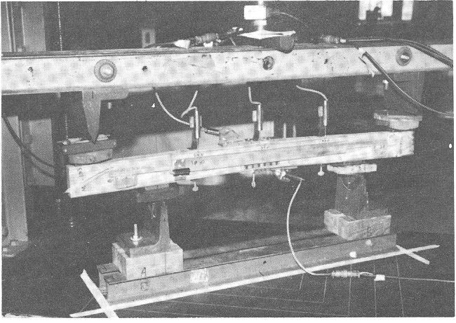 Measurement of joint gap width along the tension and compression edges of the specimen gave an indication of when the steel first began to buckle in compression and yield in tension (Fig. 5).