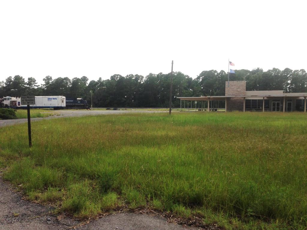7.2 ac/fec owned site 4000 sf existing bldg Zoned Commercial