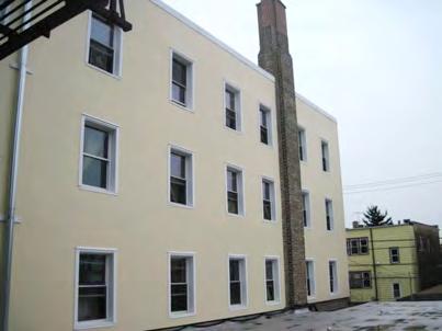Exterior insulation and over-clad of masonry Exterior insulation and