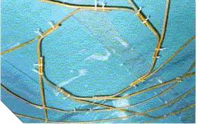 Now the spokes are placed one by one inside the outer hoop (as shown in Figure 8.) to slowly form the cover frame.