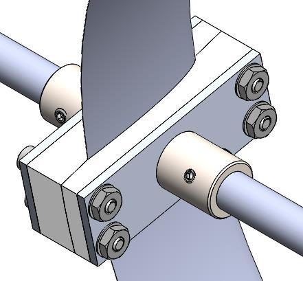 The first design required modifying the blades by drilling holes at predetermined skew angles.