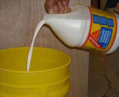 Mixing Pour Water or Latex R into clean pail.