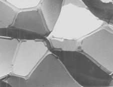 capillary action draws the filler into the pores - The resulting structure is relatively nonporous, and the infiltrated part has a more uniform density, as well as... toughness and strength Dr. M.