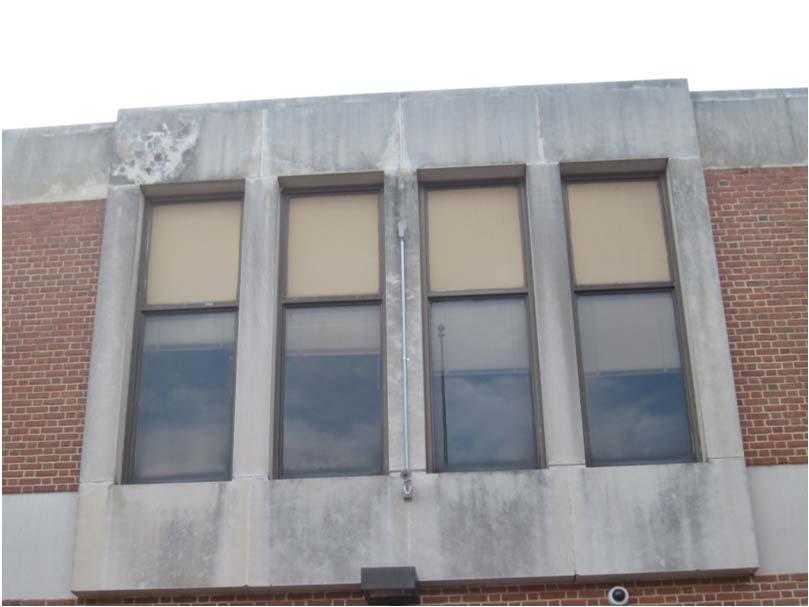 Balance of windows in 1939 building appear new within
