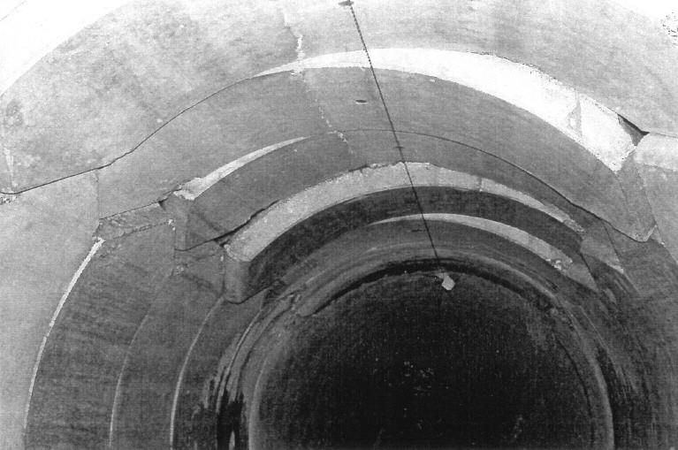 After the flood, the inspection of the tunnel revealed extensive damages on the lining. In particular as shown in Figure 3 more than 120 roof segments were displaced vertically up to 15-20 cm.