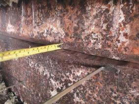 At the time of inspection, in the four drums, the entire circumference was cracked and the fractured edge of the skirt showed different levels of misalignment between the fractured edges, as shown in