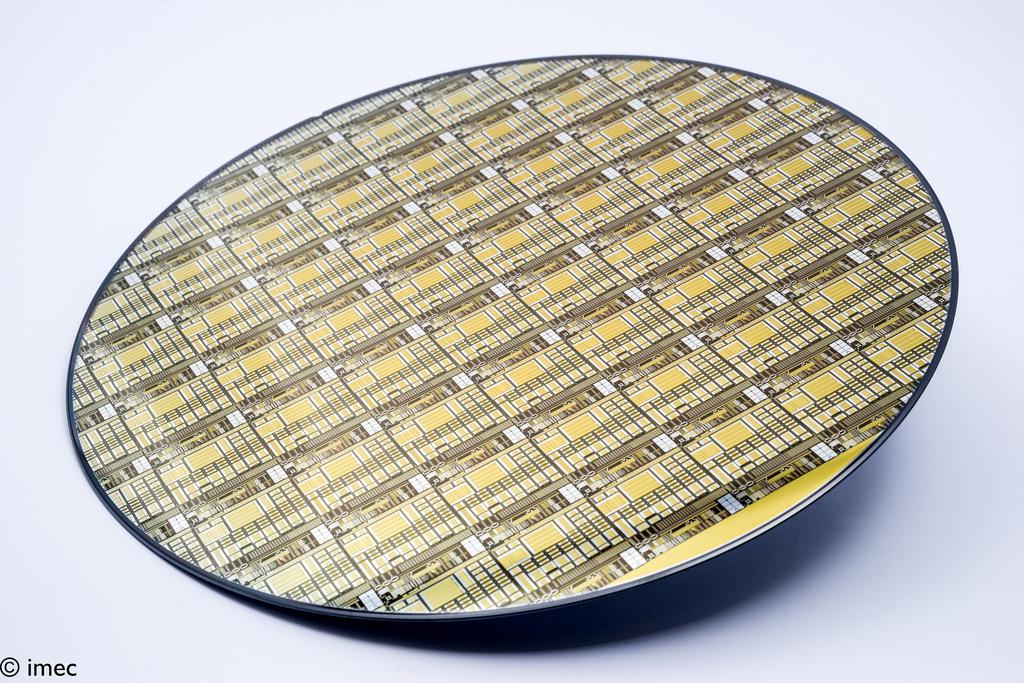 Typical 200mm Si wafer with processed GaN devices In addition to wafer fabrication, the presence of stress in the wafers also poses challenges during the packaging of these power devices.