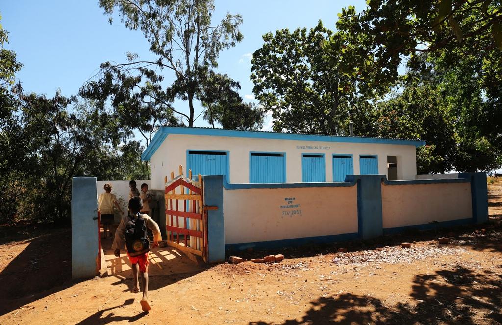 Instead of hunting for a bush to go behind, the new normal for the children at the primary school in Manakambahiny village is popping along to the toilet block between lessons.