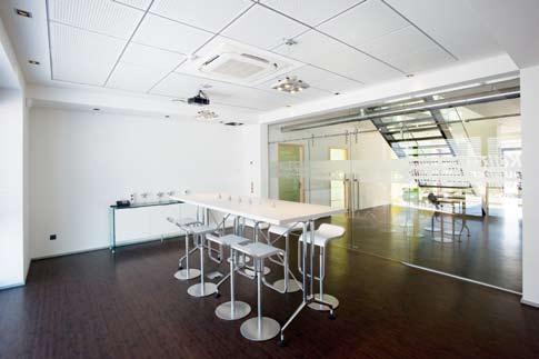 Figure 1. Interior views of the meeting room and an office. started in March 2010 as part of an nzeb project in cooperation with major research institutions.