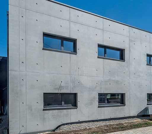 Project Examples The modern, two-storey office building stands out due to its impressive architectural concrete facade.