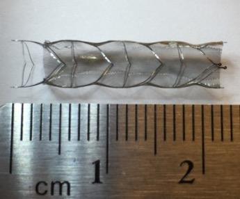 stent with a high pore density and a low % metal coverage.