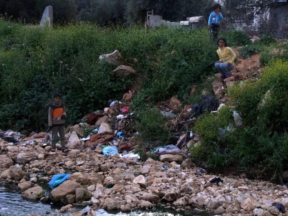 Downstream from Ariel settlement wastewater pipe 69 % of West Bank Palestinians not connected to mains sewerage and dependent on cess pits and septic tanks, often emptied directly into surrounding