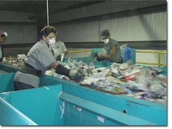 Single-stream recycling At first, the workers separate the paper and