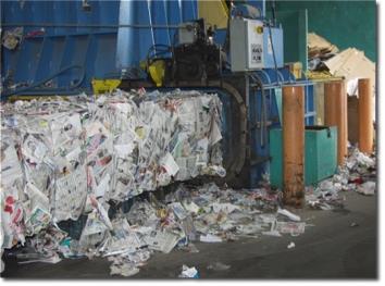 Single-stream recycling The baler compacts the loose paper into huge