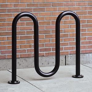 Black metal bollards are preferred for most of the downtown. These may be permanent or removable.