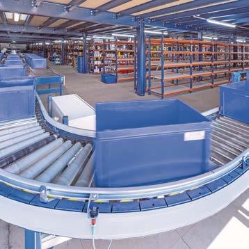 Continous belt conveyor Useful for moving boxes in a straight line when a uniform flow of load units is required,