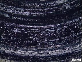 An image with abrasive wear marks spread over a very small area was captured on the ball bearing surface.