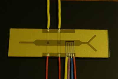 Channel layer is aligned and bonded to electrode layer.