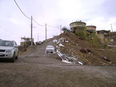 In order to make this layout practical, retaining walls were needed to form the road and stabilize the slope.