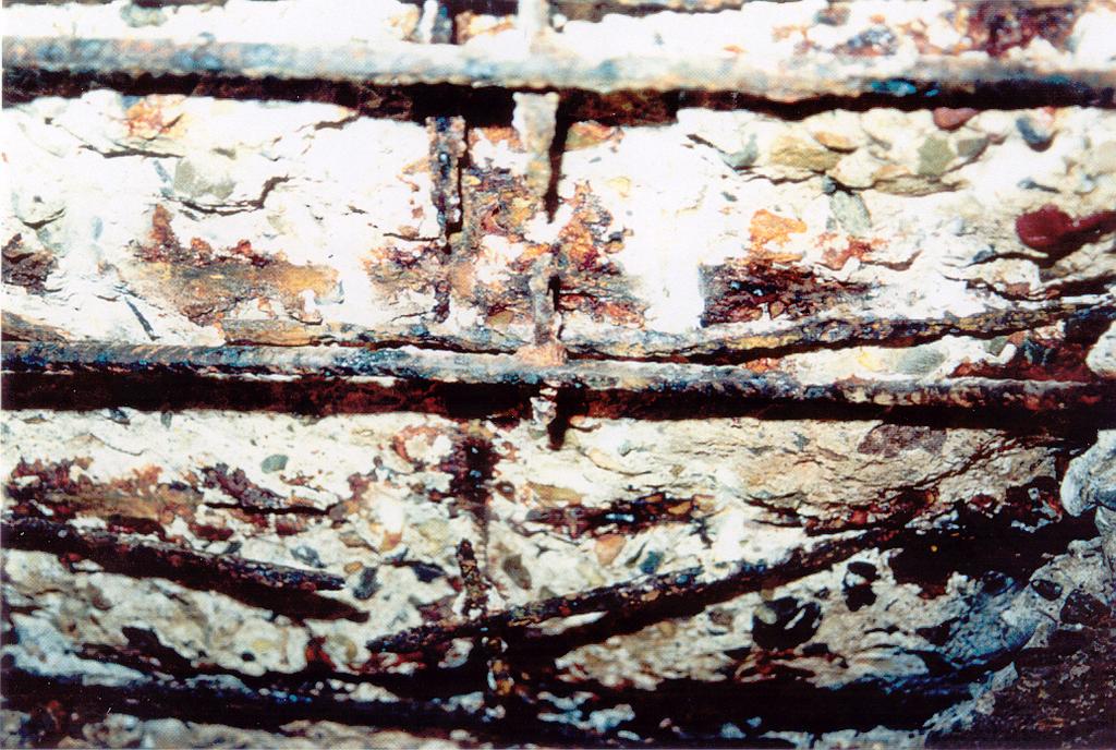 (a) Figure 1 (a) Reinforcement steel with concentrated loss of section caused by pitting corrosion from deicing salts.