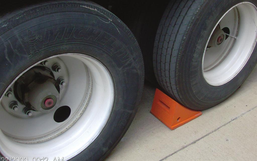 Wheel Chocks and Cradle Wheel Chocks Laminated Extra heavy-duty Contoured to fit tire Completely reversible Constructed of fabric reinforced rubber pads cut from recycled truck tires Molded Molded