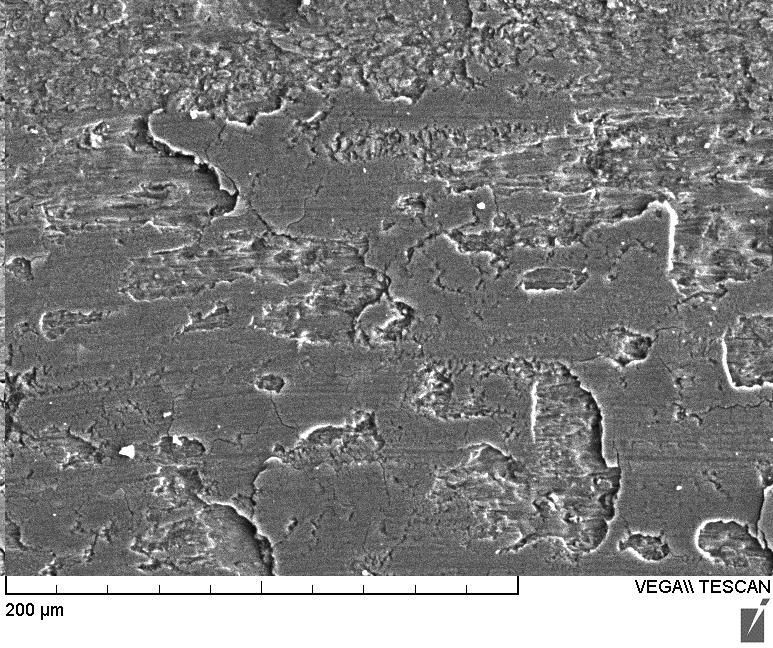 (a) Oxide films (b) Figure 6-30: SEM images of worn surface of heat-treated AISI 440C