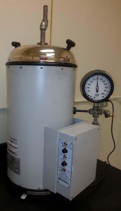 Autoclave Expansion Sample compacted with a Proctor hammer Three hours at 300 psi and 420 F Limits set by Edw. C. Levy Co.
