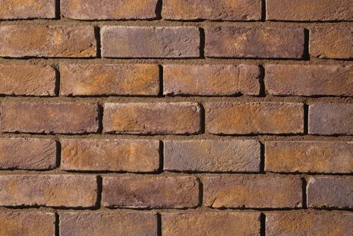 overgrout technique with Bracciano RomaBrick illustrates how rustic and old-world the face appears when Overgrout is applied.
