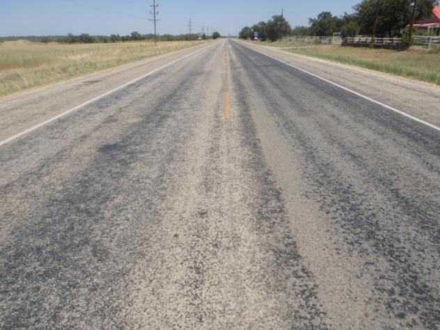 Full scale project US 183, Brownwood, to correct bleeding surface
