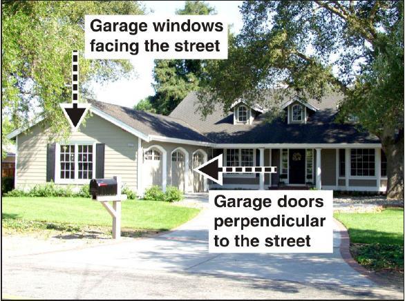 Figure 20. Side loaded garage help minimize the visual impact of larger garages on the streetscape 4. Mitigate the impact of driveways on the streetscape by: a.