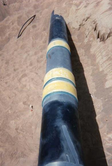 Figure 7 shows the pipeline after the gouges have been dressed and inspected.