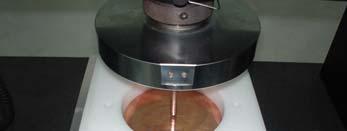 Static denting test on copper and steel plates.