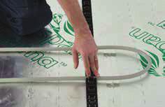 Solid Floor Systems - Clip Rail Rail step : Laying the pipe Fit the pipe into the clip