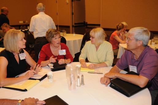 Connecting K-State to Kansas and Communities Worldwide Esther Otis (left) leads participants in a breakout session at the 2010 Rural Grocery Store Summit.