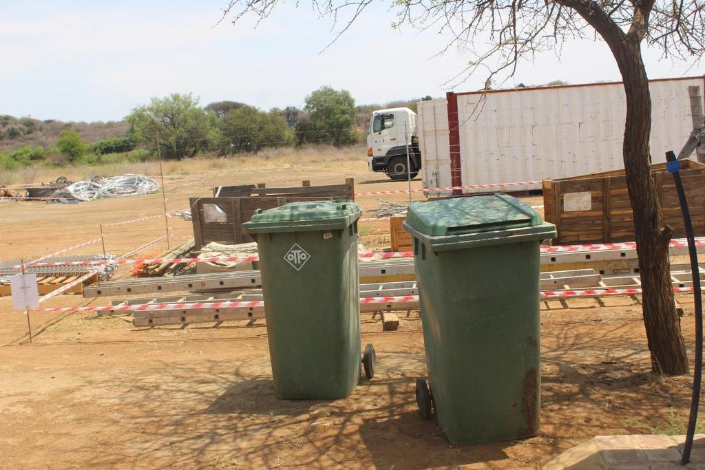 M Waste bins at the camp site and waste in the field is collected for safe disposal Top picture Recommendation: Keep surrounds of the site office clean by keeping litter and placing in the bins place
